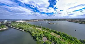 Dnepr Prints: The beautiful river is surrounded by green and fresh vegetation in the city