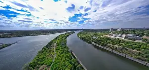 Dnepr Prints: The beautiful river is surrounded by green and fresh vegetation in the city