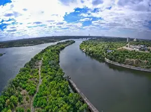 Dnepr Prints: The beautiful river is surrounded by green and fresh vegetation in the city