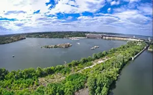 Dnepr Prints: The beautiful river is surrounded by green and fresh vegetation in the city