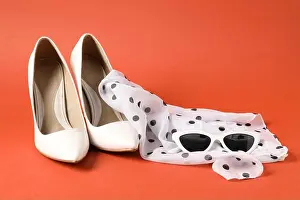 Vogue Prints: Beautiful scarf, sunglasses and heels on color background