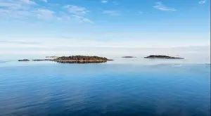 Beautiful sea landscape with island and nice evening light at summer day in archipelago Gulf of Finland