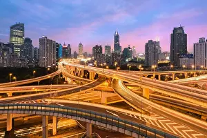 Beautiful Shanghai city with interchange overpass at nightfall in Shanghai, China
