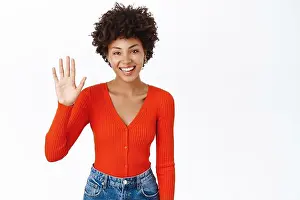 Multiethnic Prints: Beautiful smiling woman saying hello