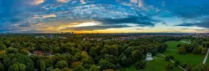 A beautiful start in the day. Sunset over Munichs English Garden as an aerial panorama shot