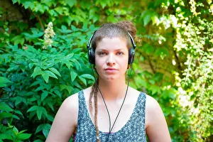 Blue Eye Prints: beautiful stylish modern young woman listening to music in the city