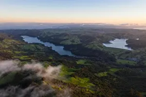 A beautiful sunrise illuminates the hills surrounding San Francisco Bay in Northern California. This area is often covered by a thick marine layer