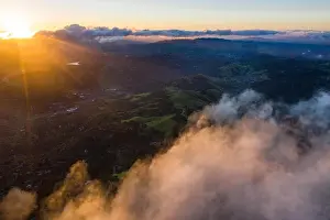 A beautiful sunrise illuminates the hills surrounding San Francisco Bay in Northern California. This area is often covered by a thick marine layer