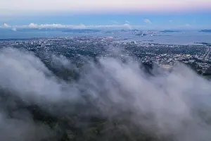 A beautiful sunrise illuminates the hills surrounding San Francisco Bay in Northern California. This area is often covered by a thick marine layer