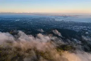 A beautiful sunrise illuminates the hills surrounding San Francisco Bay in Northern California. This area is often covered by a thick marine layer