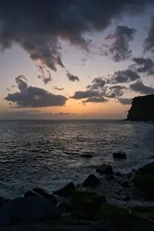 A Beautiful sunset on the Atlantic Ocean off the coast of Madeira island, Portugal, seen from Calheta