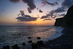 A Beautiful sunset on the Atlantic Ocean off the coast of Madeira island, Portugal, seen from Calheta
