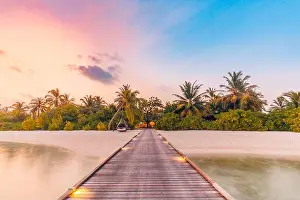 Sunset Beach Prints: Beautiful sunset beach scene. Colorful sky and clouds view with calm sea and relaxing tropical mood