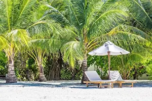 Beautiful sunset relax beach. Chairs on sandy beach near the sea. Summer holiday and vacation concept for tourism. Inspire romance tropical landscape