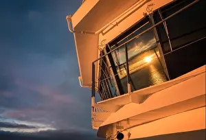 Handrail Prints: Beautiful sunset view from ship deck at evening in Gulf Of Finland