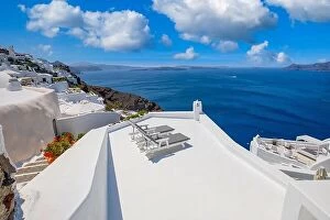 Images Dated 25th July 2021: Beautiful travel background for vacation holiday banner. White houses in the town of Oia