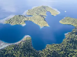 Equator Prints: Beautiful, tropical islands rise from the seascape in Raja Ampat