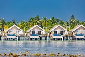 Images Dated 7th January 2017: Beautiful tropical Maldives resort hotel and island with beach