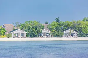 Beautiful tropical Maldives resort hotel and island with beach and sea on sky for holiday vacation background concept - Boost up color Processing