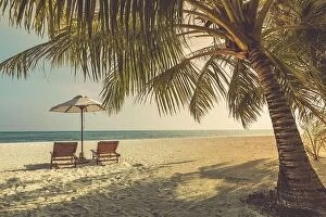 Images Dated 13th December 2018: Beautiful tropical outdoor beach sea ocean with umbrella and chair