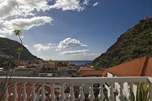 Holiday House Prints: Beautiful view from an antique balcony in coastal town in Madeira island on a town