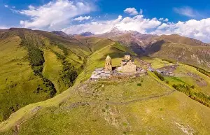 Beautiful Top view from drone to Tsminda Sameba or Holy Trinity Church Near Village Of Gergeti In Georgia