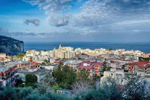 Blue Sea Prints: A beautiful view across the rooftops of vico equense and the bay of naples towards the island of ischia