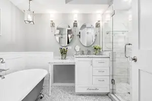 Faucet Prints: A beautiful white bathroom with a stand alone clawfoot bathtub with chrome hardware