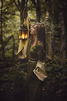 Velvet Prints: Beautiful woman walking in fairy forest with a lantern. Dark fantasy