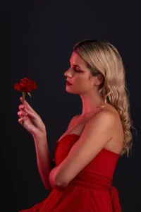 Contemplating Prints: Beauty, fashion and woman with a rose on a dark