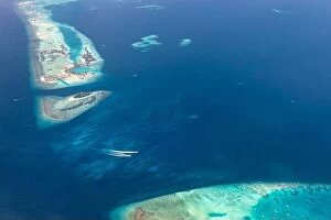 Images Dated 22nd May 2019: Beauty tropical island. Aerial view on tropical islands in the Indian ocean, atolls with coral reef