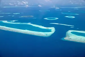 Beauty tropical island. Aerial view on tropical islands, drone, plane view from coral reef atoll in Maldives islands. Exotic travel nature destination