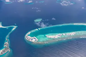 Beauty tropical island. Aerial view on tropical islands, drone, plane view from coral reef atoll in Maldives islands. Exotic travel nature destination