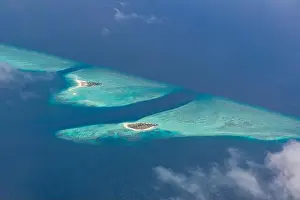 Beauty tropical island. Aerial view on tropical islands, drone, plane view from coral reef atoll in Maldives islands. Exotic travel nature destination