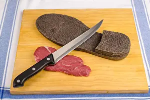 Steak Prints: Beef steak next to a shoe sole, a poor quality meat concept