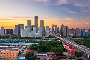 Beijing, China overlooking the central business district skyline at sunset