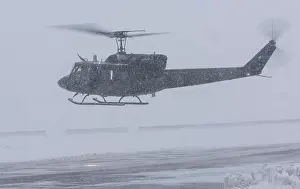 Hours Prints: Bell UH-1N Iroquois is a twin-engine utility helicopter manufactured by Bell Helicopter for the United States Air Force