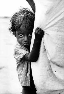 Pakistan Prints: Bengali child clings to mother fleeing atrocities of war in Bangladesh Nov 1971