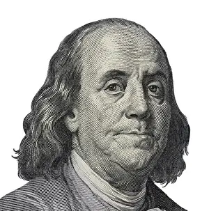 Benjamin Prints: Benjamin Ben Franklin face on US 100 dollar bill closeup isolated
