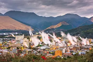 Beppu, Japan cityscape with hot spring bath houses at night
