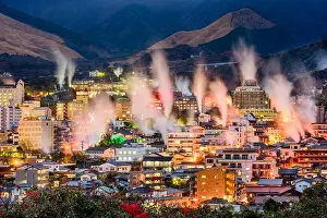 Baths Prints: Beppu, Japan cityscape with hot spring bath houses with rising steam