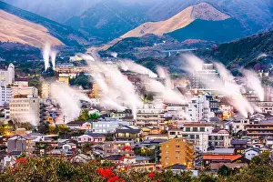Beppu, Japan cityscape with hot spring bath houses with rising steam