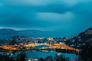 Aerial Landscape Collection: Bergen, Norway. Aerial View Cityscape Of Bergen And Harbor From Mountain Top In Blue Hour