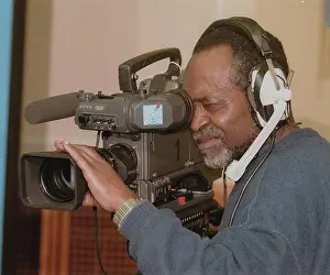 Migrants Prints: Berlin / Foreigners / Africa / Professions / Press 1998 Cameraman of SFB / RBB from Africa