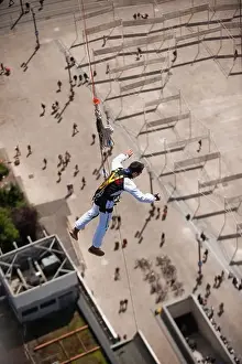 20 30 Years Prints: Berlin, Germany, Springer bungee jumping from the roof of the Park Inn Hotel