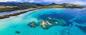 Dreamlike Prints: Best beaches of Corsica island - aerial panoramic view of beautiful Santa Giulia long beach with sault lake from one
