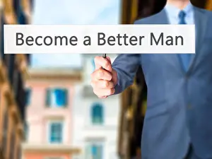 Optimistic Prints: Become a Better Man - Businessman hand holding sign