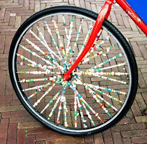 Holland Netherlands Prints: Bicycle wheel with spokes decorated with beds, Holland