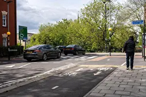 Directions Prints: A bidirectional protected cycle track and parallel zebra crossing form part of the Filwood Greenway cycling