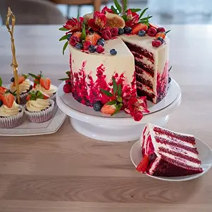 Muffins Prints: Big beautiful red velvet cake, with flowers and berries on top